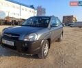 Серый Хендай Туксон, объемом двигателя 1.98 л и пробегом 250 тыс. км за 6999 $, фото 1 на Automoto.ua