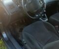 Серый Хендай Туксон, объемом двигателя 1.98 л и пробегом 240 тыс. км за 7300 $, фото 2 на Automoto.ua