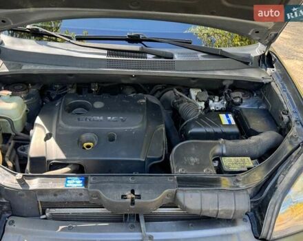 Серый Хендай Туксон, объемом двигателя 1.99 л и пробегом 146 тыс. км за 10000 $, фото 13 на Automoto.ua