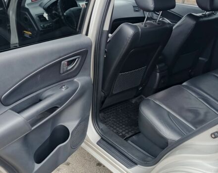 Серый Хендай Туксон, объемом двигателя 2 л и пробегом 200 тыс. км за 9200 $, фото 1 на Automoto.ua