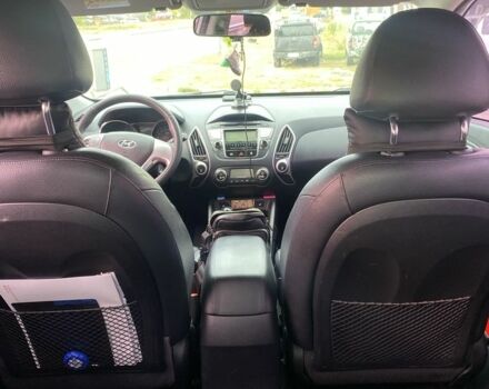 Сірий Хендай Туксон, об'ємом двигуна 2 л та пробігом 206 тис. км за 11500 $, фото 10 на Automoto.ua