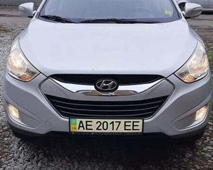 Серый Хендай Туксон, объемом двигателя 2.4 л и пробегом 115 тыс. км за 11200 $, фото 9 на Automoto.ua