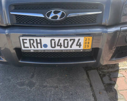 Серый Хендай Туксон, объемом двигателя 1.98 л и пробегом 117 тыс. км за 10350 $, фото 6 на Automoto.ua