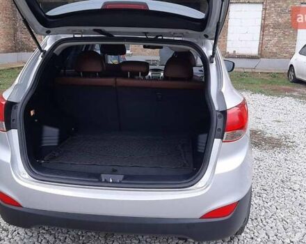 Серый Хендай Туксон, объемом двигателя 2.4 л и пробегом 115 тыс. км за 11200 $, фото 10 на Automoto.ua