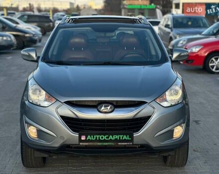 Серый Хендай Туксон, объемом двигателя 2.36 л и пробегом 150 тыс. км за 12990 $, фото 4 на Automoto.ua