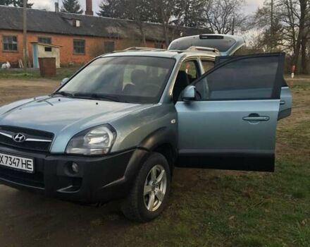 Сірий Хендай Туксон, об'ємом двигуна 2 л та пробігом 166 тис. км за 9500 $, фото 29 на Automoto.ua