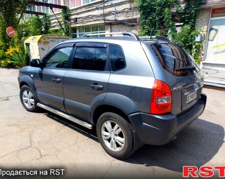 Серый Хендай Туксон, объемом двигателя 2 л и пробегом 245 тыс. км за 9500 $, фото 4 на Automoto.ua