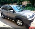 Серый Хендай Туксон, объемом двигателя 2 л и пробегом 245 тыс. км за 9500 $, фото 1 на Automoto.ua