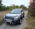 Серый Хендай Туксон, объемом двигателя 1.98 л и пробегом 154 тыс. км за 8100 $, фото 1 на Automoto.ua