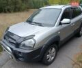 Серый Хендай Туксон, объемом двигателя 1.98 л и пробегом 154 тыс. км за 8100 $, фото 2 на Automoto.ua