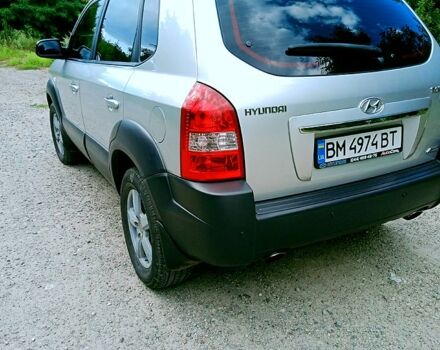Сірий Хендай Туксон, об'ємом двигуна 2 л та пробігом 181 тис. км за 9900 $, фото 4 на Automoto.ua