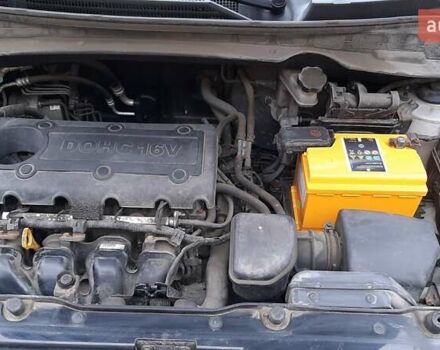 Серый Хендай Туксон, объемом двигателя 2.4 л и пробегом 115 тыс. км за 11200 $, фото 7 на Automoto.ua