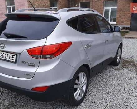 Серый Хендай Туксон, объемом двигателя 2.4 л и пробегом 115 тыс. км за 11200 $, фото 8 на Automoto.ua