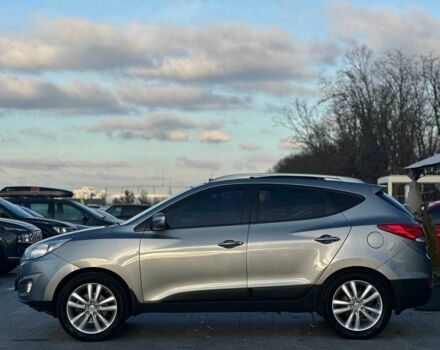 Серый Хендай Туксон, объемом двигателя 2.4 л и пробегом 150 тыс. км за 12990 $, фото 5 на Automoto.ua