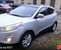 Серый Хендай Туксон, объемом двигателя 2.4 л и пробегом 115 тыс. км за 11500 $, фото 6 на Automoto.ua