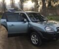 Сірий Хендай Туксон, об'ємом двигуна 2 л та пробігом 166 тис. км за 9500 $, фото 25 на Automoto.ua
