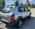 Серый Хендай Туксон, объемом двигателя 2 л и пробегом 139 тыс. км за 8700 $, фото 4 на Automoto.ua