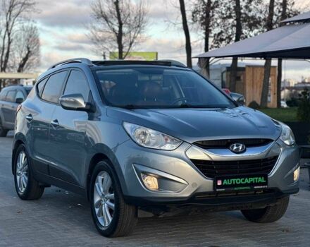 Серый Хендай Туксон, объемом двигателя 2.4 л и пробегом 150 тыс. км за 12990 $, фото 2 на Automoto.ua