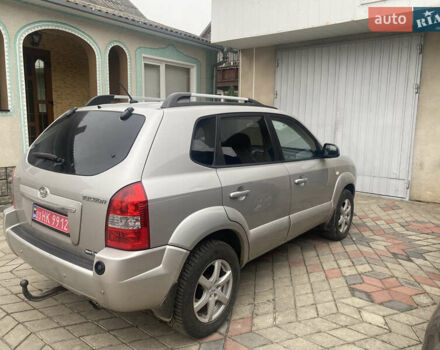 Сірий Хендай Туксон, об'ємом двигуна 1.98 л та пробігом 183 тис. км за 8350 $, фото 3 на Automoto.ua