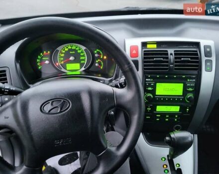 Серый Хендай Туксон, объемом двигателя 2 л и пробегом 100 тыс. км за 10400 $, фото 86 на Automoto.ua