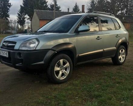 Сірий Хендай Туксон, об'ємом двигуна 2 л та пробігом 166 тис. км за 9500 $, фото 6 на Automoto.ua