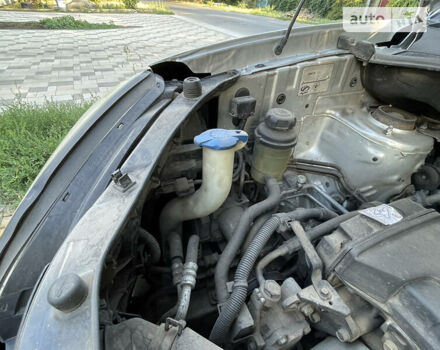 Серый Хендай Туксон, объемом двигателя 2 л и пробегом 128 тыс. км за 8900 $, фото 76 на Automoto.ua