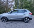 Серый Хендай Туксон, объемом двигателя 2 л и пробегом 75 тыс. км за 10962 $, фото 1 на Automoto.ua