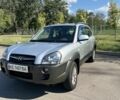 Серый Хендай Туксон, объемом двигателя 2 л и пробегом 139 тыс. км за 8700 $, фото 5 на Automoto.ua