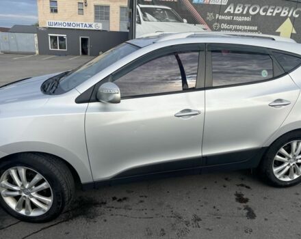 Сірий Хендай Туксон, об'ємом двигуна 2 л та пробігом 206 тис. км за 11500 $, фото 7 на Automoto.ua