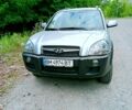 Сірий Хендай Туксон, об'ємом двигуна 2 л та пробігом 181 тис. км за 9900 $, фото 6 на Automoto.ua