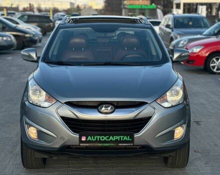 Серый Хендай Туксон, объемом двигателя 2.4 л и пробегом 150 тыс. км за 12990 $, фото 3 на Automoto.ua