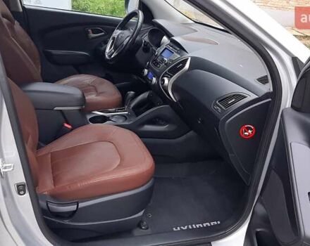 Серый Хендай Туксон, объемом двигателя 2.4 л и пробегом 115 тыс. км за 11200 $, фото 4 на Automoto.ua