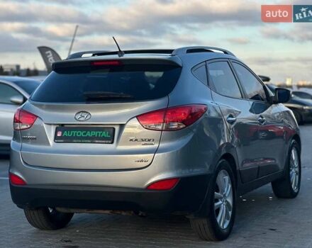 Серый Хендай Туксон, объемом двигателя 2.36 л и пробегом 150 тыс. км за 12990 $, фото 7 на Automoto.ua