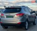 Серый Хендай Туксон, объемом двигателя 2.36 л и пробегом 150 тыс. км за 12990 $, фото 7 на Automoto.ua