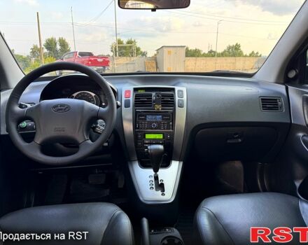 Сірий Хендай Туксон, об'ємом двигуна 2 л та пробігом 120 тис. км за 10700 $, фото 5 на Automoto.ua