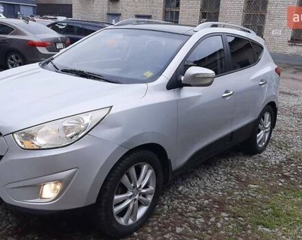 Серый Хендай Туксон, объемом двигателя 2.4 л и пробегом 115 тыс. км за 11200 $, фото 12 на Automoto.ua