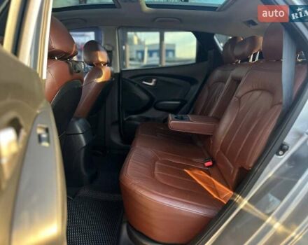 Серый Хендай Туксон, объемом двигателя 2.36 л и пробегом 150 тыс. км за 12990 $, фото 18 на Automoto.ua