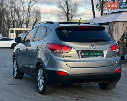 Серый Хендай Туксон, объемом двигателя 2.36 л и пробегом 150 тыс. км за 12990 $, фото 5 на Automoto.ua