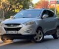 Серый Хендай Туксон, объемом двигателя 2.4 л и пробегом 166 тыс. км за 9700 $, фото 1 на Automoto.ua