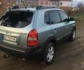 Сірий Хендай Туксон, об'ємом двигуна 2 л та пробігом 166 тис. км за 9500 $, фото 3 на Automoto.ua