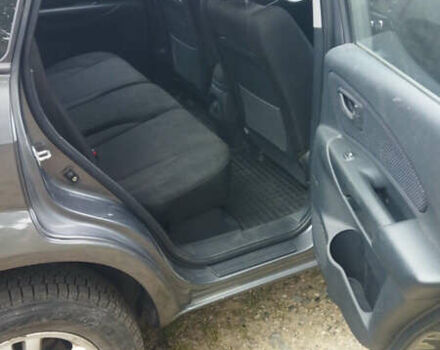 Сірий Хендай Туксон, об'ємом двигуна 2 л та пробігом 59 тис. км за 10400 $, фото 6 на Automoto.ua