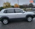 Серый Хендай Туксон, объемом двигателя 2 л и пробегом 100 тыс. км за 10400 $, фото 16 на Automoto.ua
