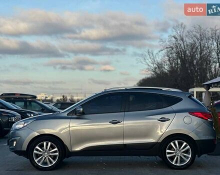 Серый Хендай Туксон, объемом двигателя 2.36 л и пробегом 150 тыс. км за 12990 $, фото 6 на Automoto.ua
