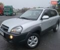 Серый Хендай Туксон, объемом двигателя 2 л и пробегом 100 тыс. км за 10400 $, фото 1 на Automoto.ua