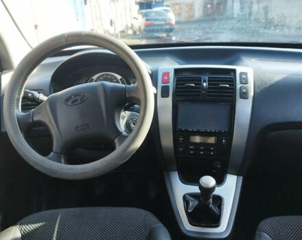 Серый Хендай Туксон, объемом двигателя 2 л и пробегом 168 тыс. км за 9499 $, фото 5 на Automoto.ua