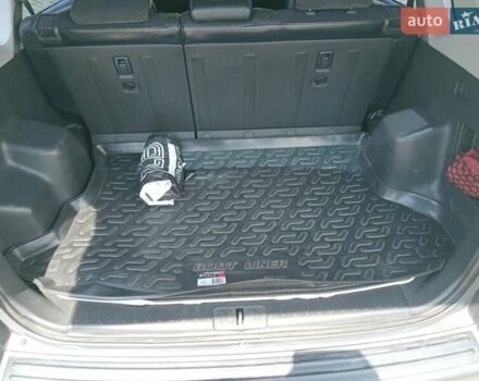 Серый Хендай Туксон, объемом двигателя 1.98 л и пробегом 131 тыс. км за 10650 $, фото 19 на Automoto.ua