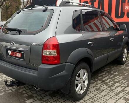 Серый Хендай Туксон, объемом двигателя 1.98 л и пробегом 174 тыс. км за 9500 $, фото 6 на Automoto.ua