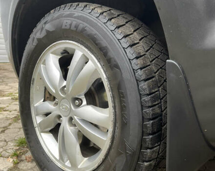 Серый Хендай Туксон, объемом двигателя 1.99 л и пробегом 209 тыс. км за 8200 $, фото 9 на Automoto.ua