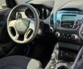 Сірий Хендай Туксон, об'ємом двигуна 2 л та пробігом 220 тис. км за 312 $, фото 4 на Automoto.ua