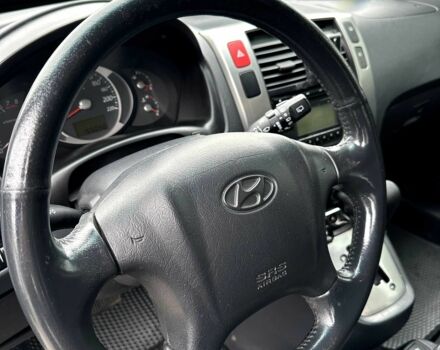 Серый Хендай Туксон, объемом двигателя 2 л и пробегом 150 тыс. км за 9900 $, фото 7 на Automoto.ua